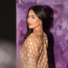 Side view of beige jacquard shirt with embroidered sleeves – formal wear for women