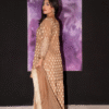 Side profile of beige jacquard short shirt and wide sharara formal wear for women